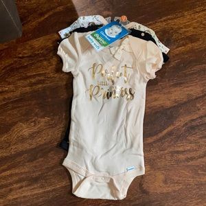 3 baby onesies